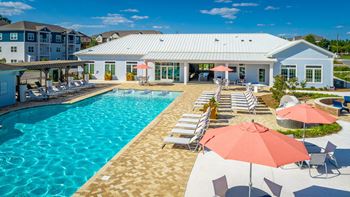 Two heated saltwater pools with sundeck & lounge ledge